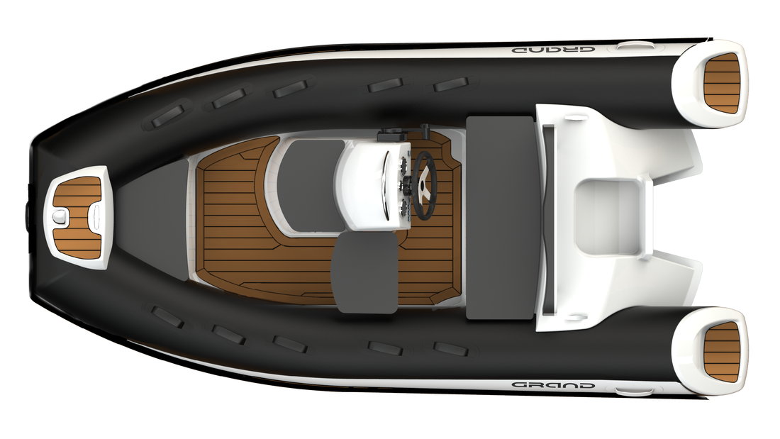 Top-down view of a black and white speedboat with brown and gray seating seats in the center.