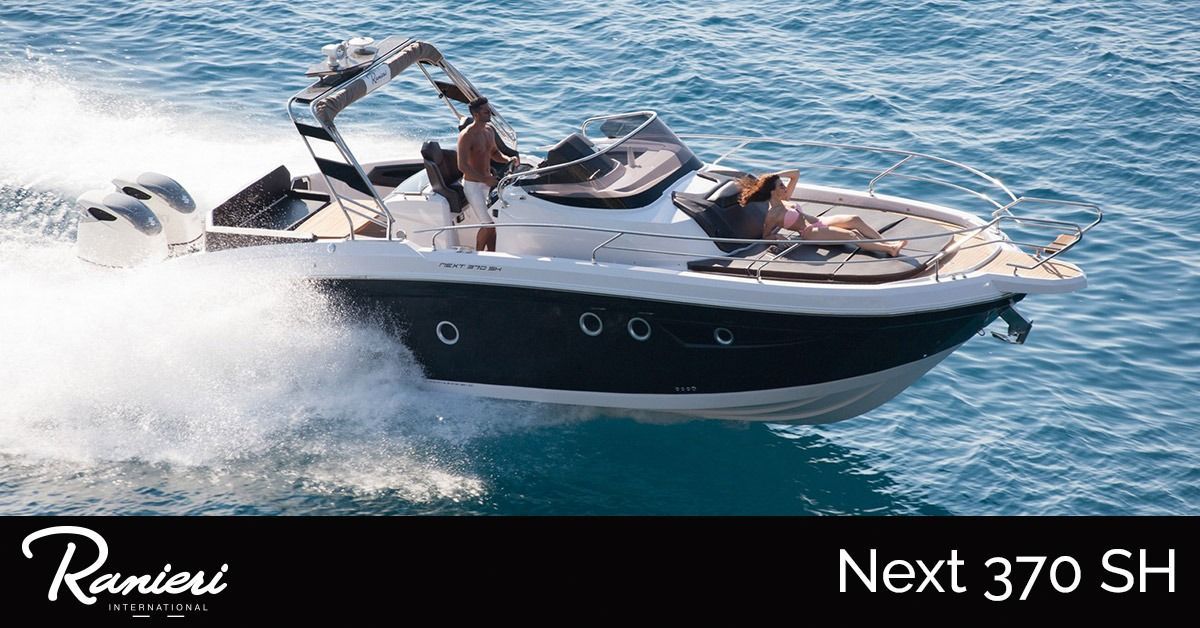 Black ranieri next 370 sport speedboat skimming over blue water, with passengers aboard and spray behind it