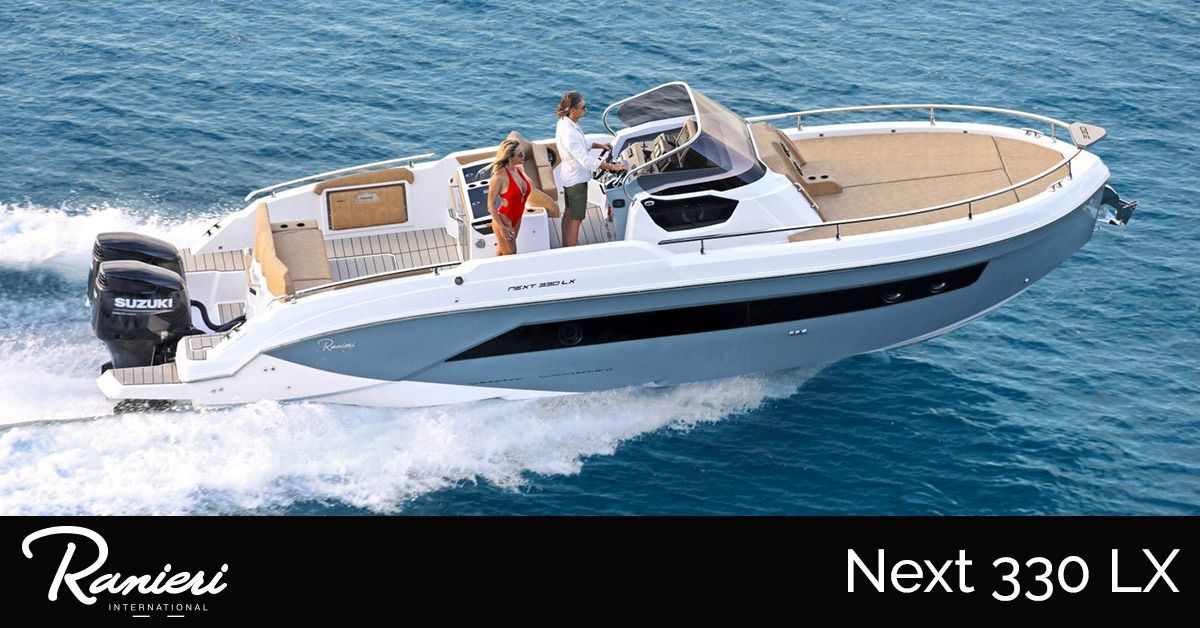 White and tan ranieri Next 330 LX speedboat cruising on blue water with two people aboard