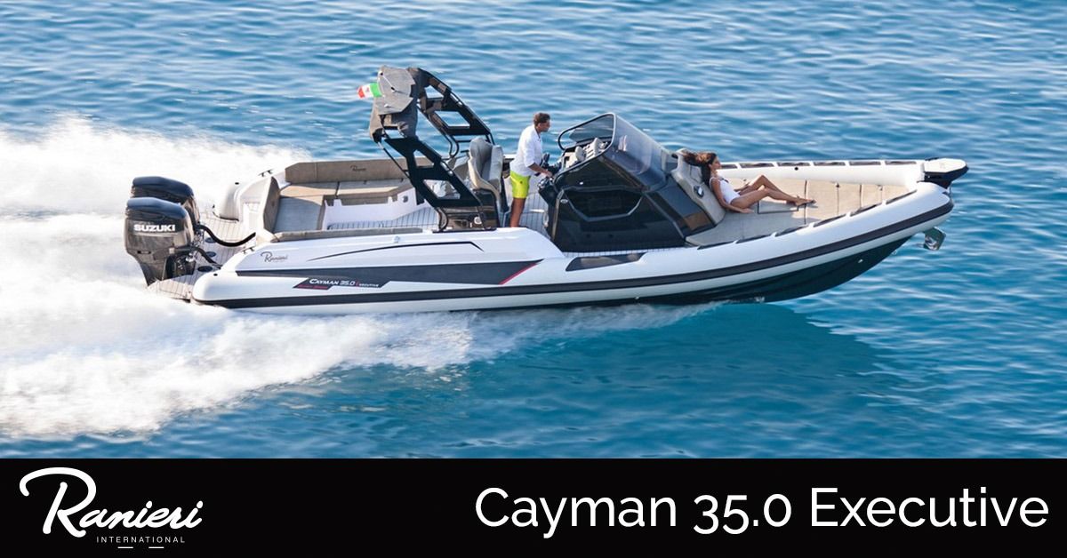White and gray speedboat on blue water with “Cayman 35.0 Executive” text below