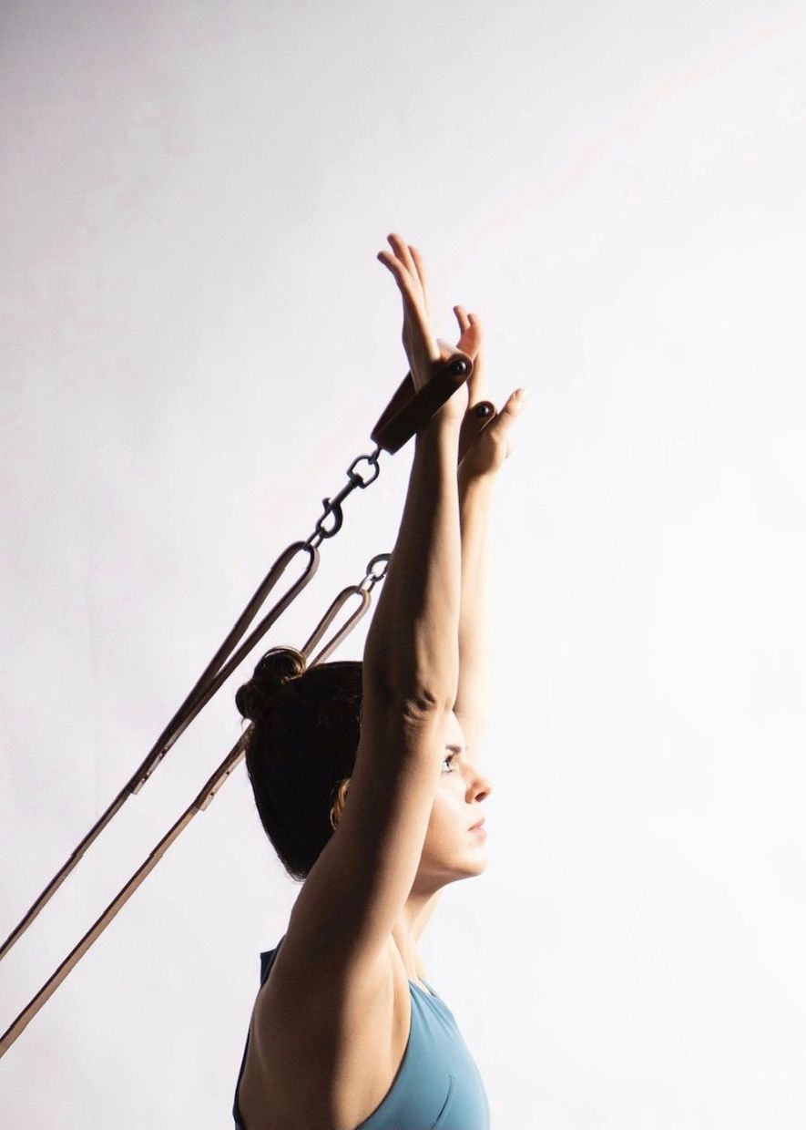 Photo of a woman doing pilates
