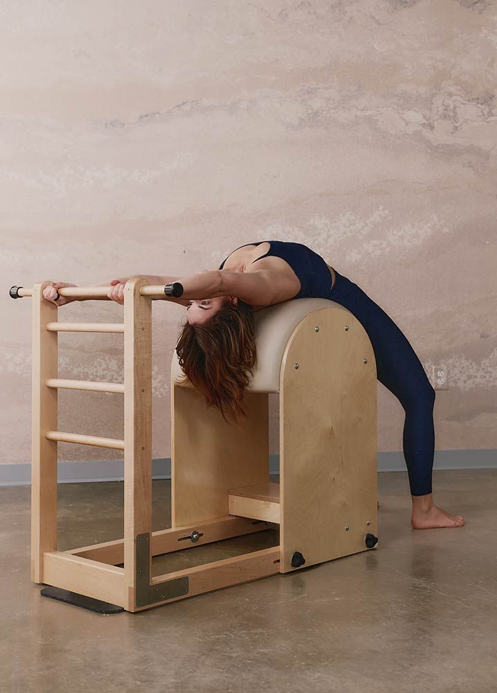 Photo of a woman doing pilates