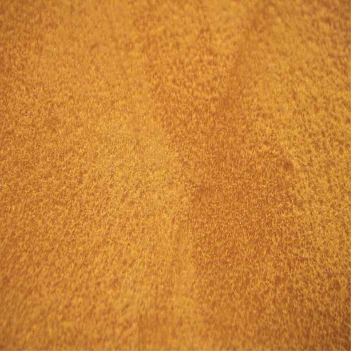 A close up of a brown leather texture.