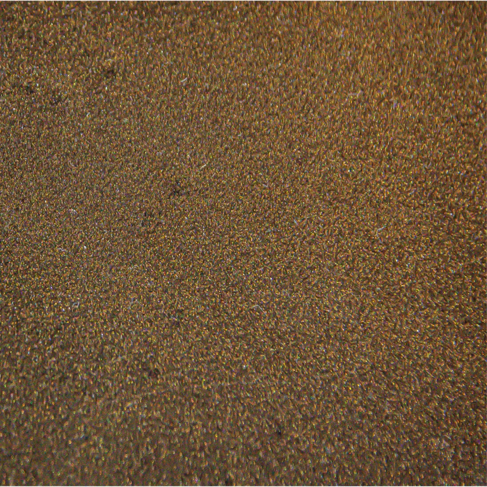 A close up of a brown surface with a grainy texture
