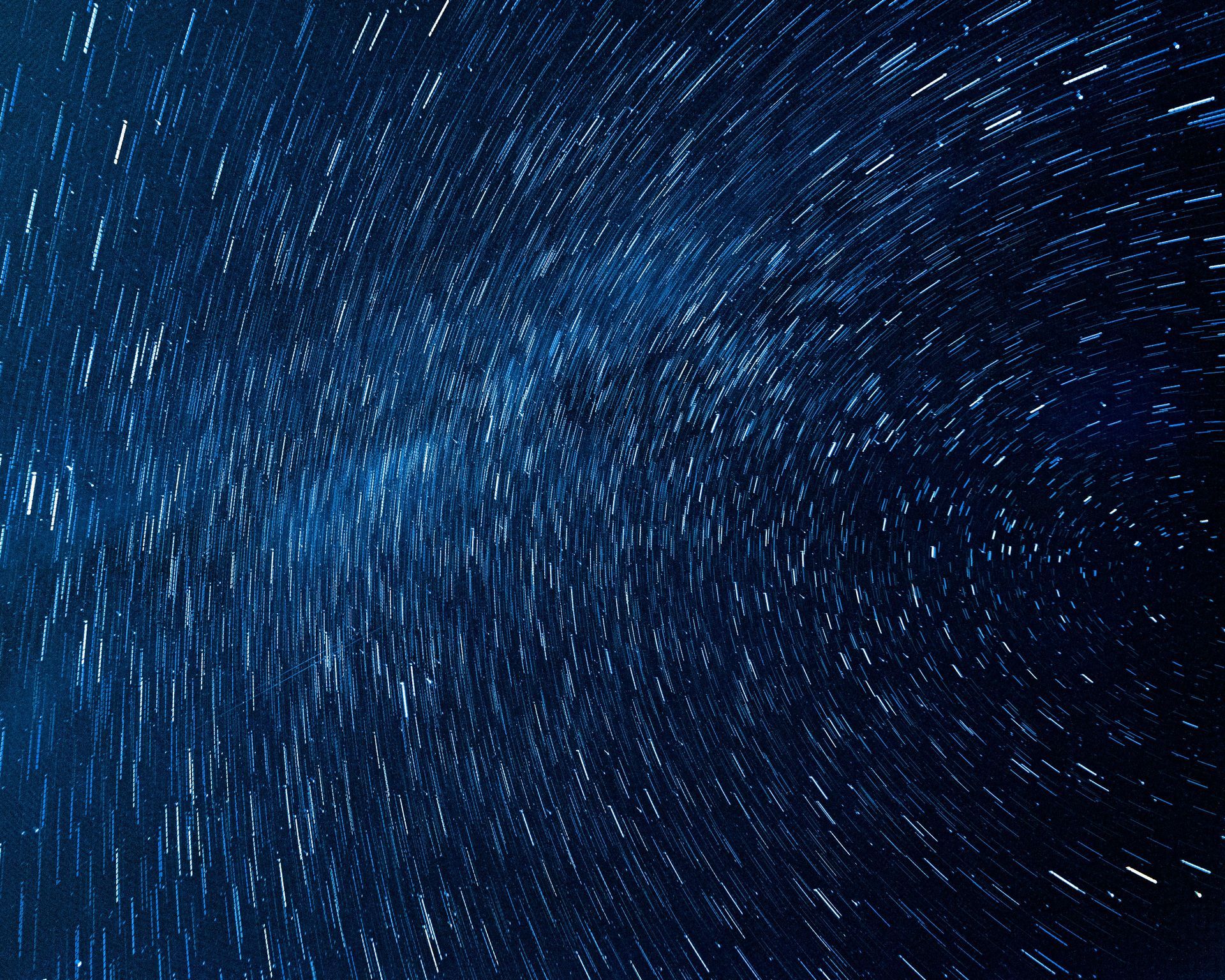 A blue background with a lot of stars in it