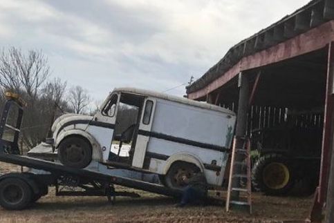 The Divco truck being transported to MOOseum location for restoration