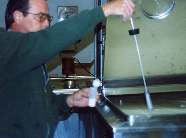 The driver tests the milk for purity and butterfat