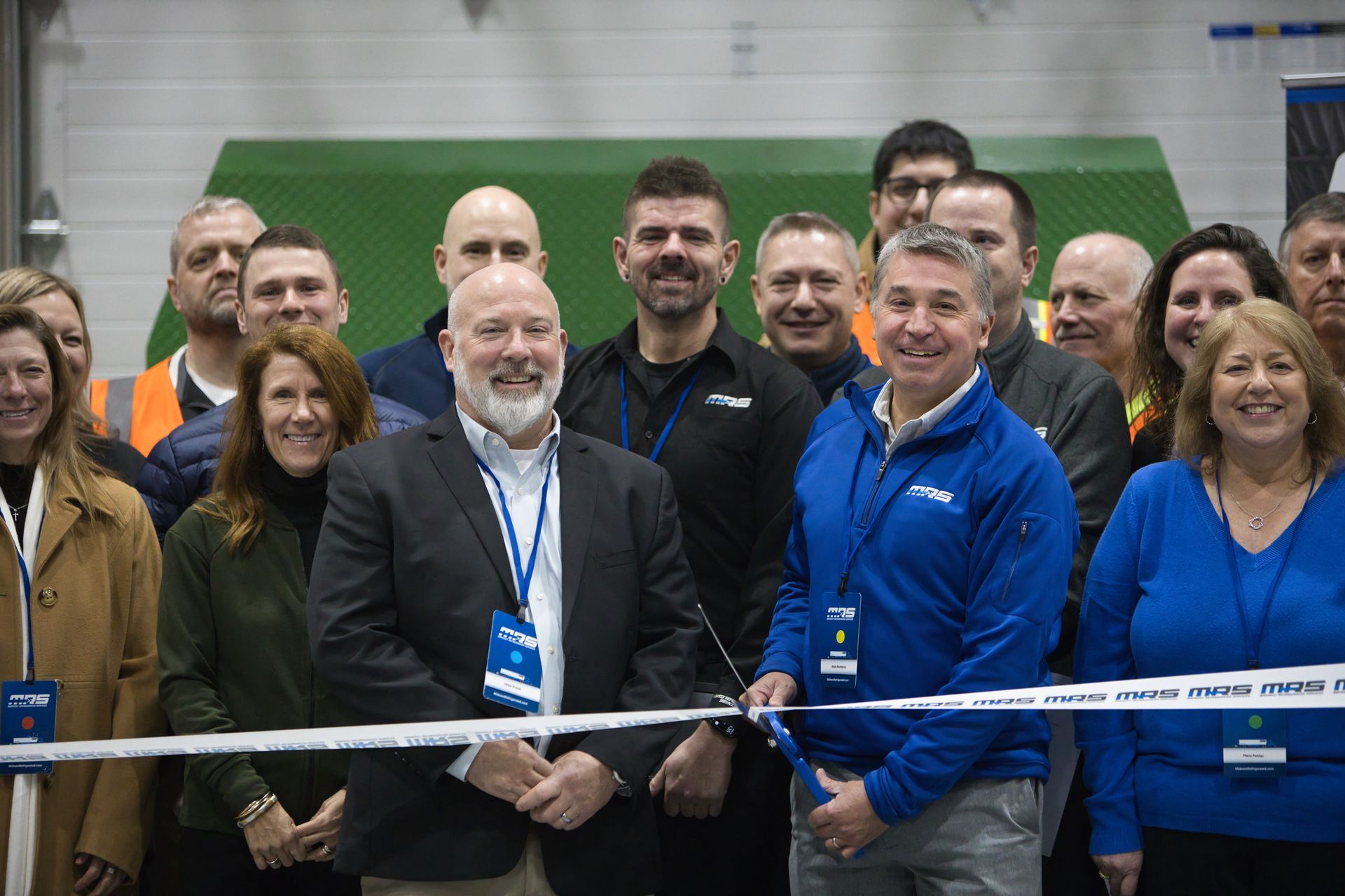Mike Pokel and Matt Pomeroy cutting the ribbon for MRS