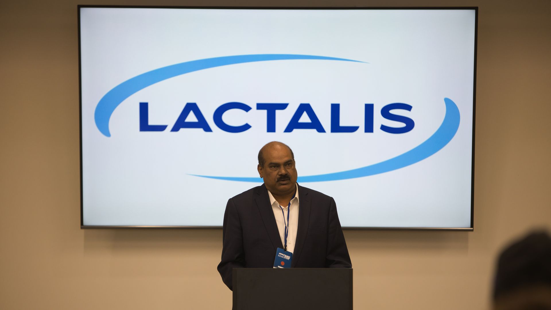 Vice President of Supply Chain at Lactalis USA - Sri Adapa talking before the ribbon cutting.