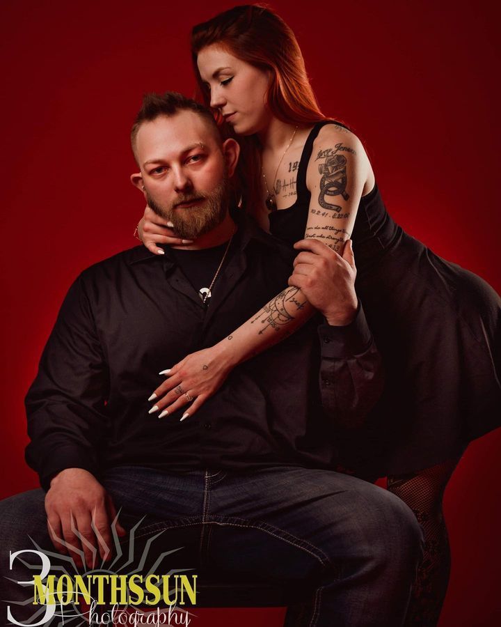 A man and a woman are posing for a photo by 3 months sun photography