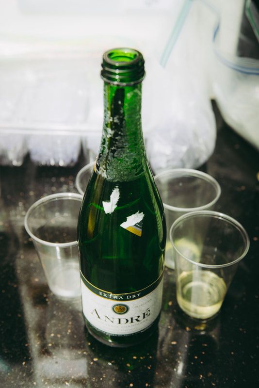 A bottle of andick wine is sitting on a counter