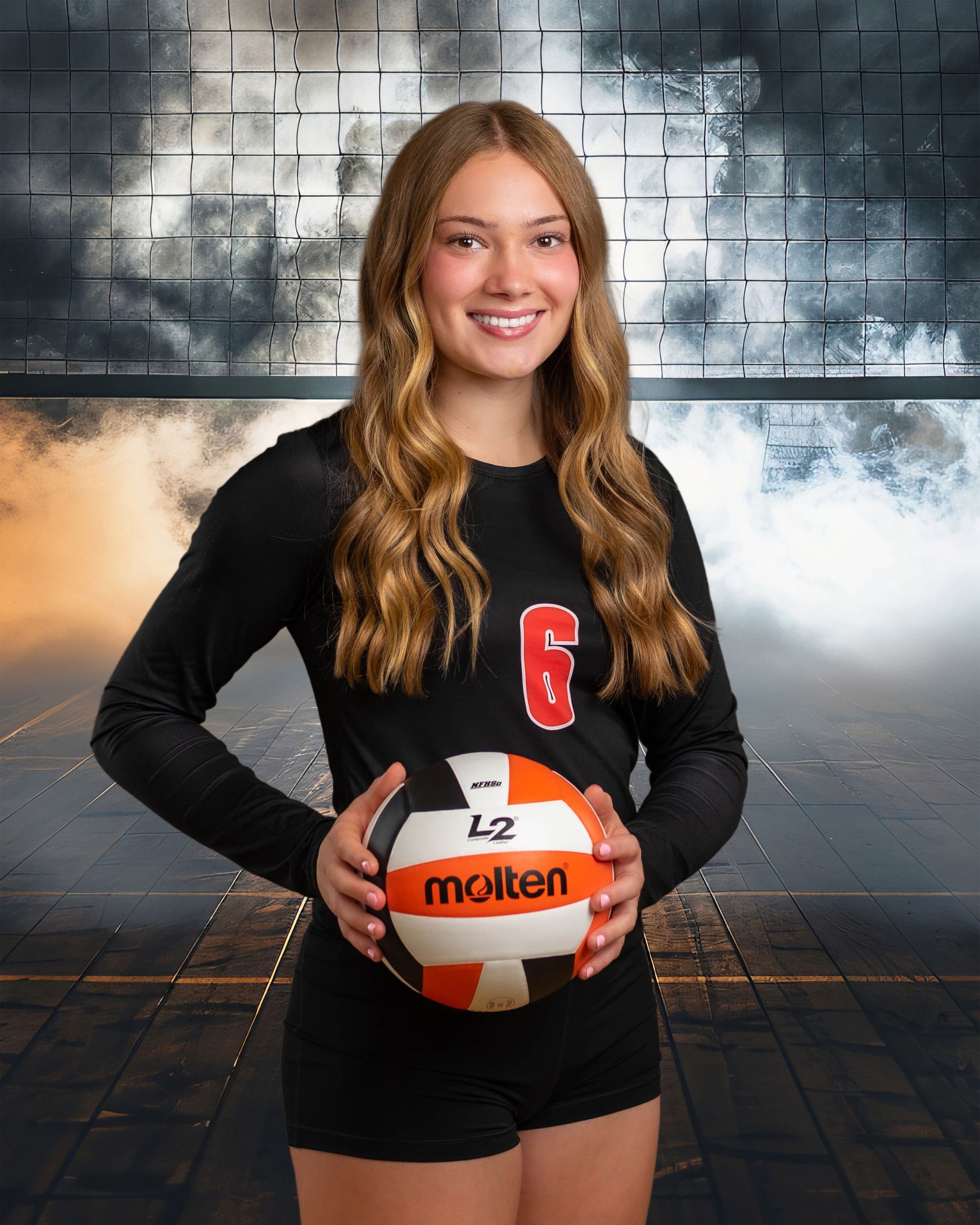 A young woman is holding a volleyball in her hands in front of a brick wall.