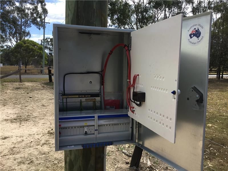 Metal Electrical Box, Open, Mounted on a Pole Outdoors — Carl Voss Electrical In Urangan, QLD