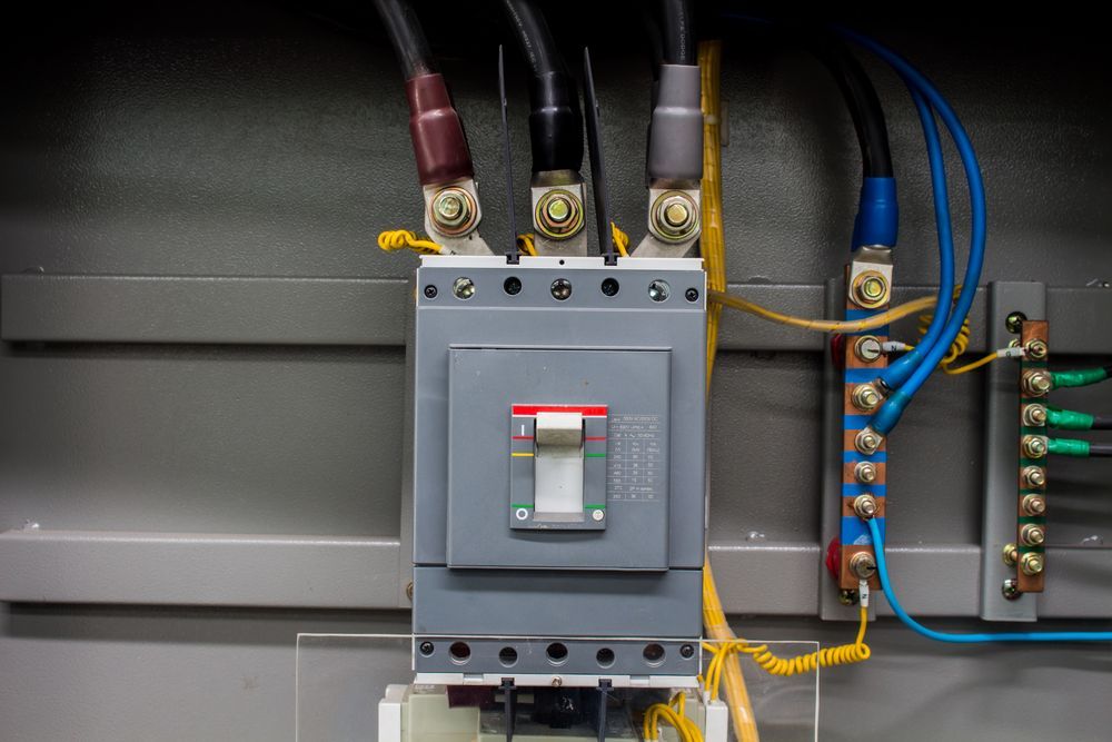 Gray Circuit Breaker With Connected Wires of Brown, Black, and Gray — Carl Voss Electrical In Urangan, QLD