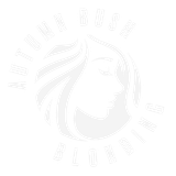 A white logo with a woman 's face and the words `` autumn bush blonding ''.