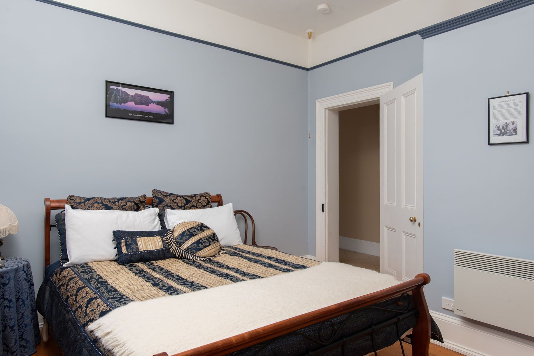 one of the bedrooms in the main house with queen bed