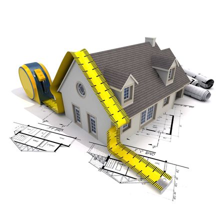 A house is being measured with a tape measure