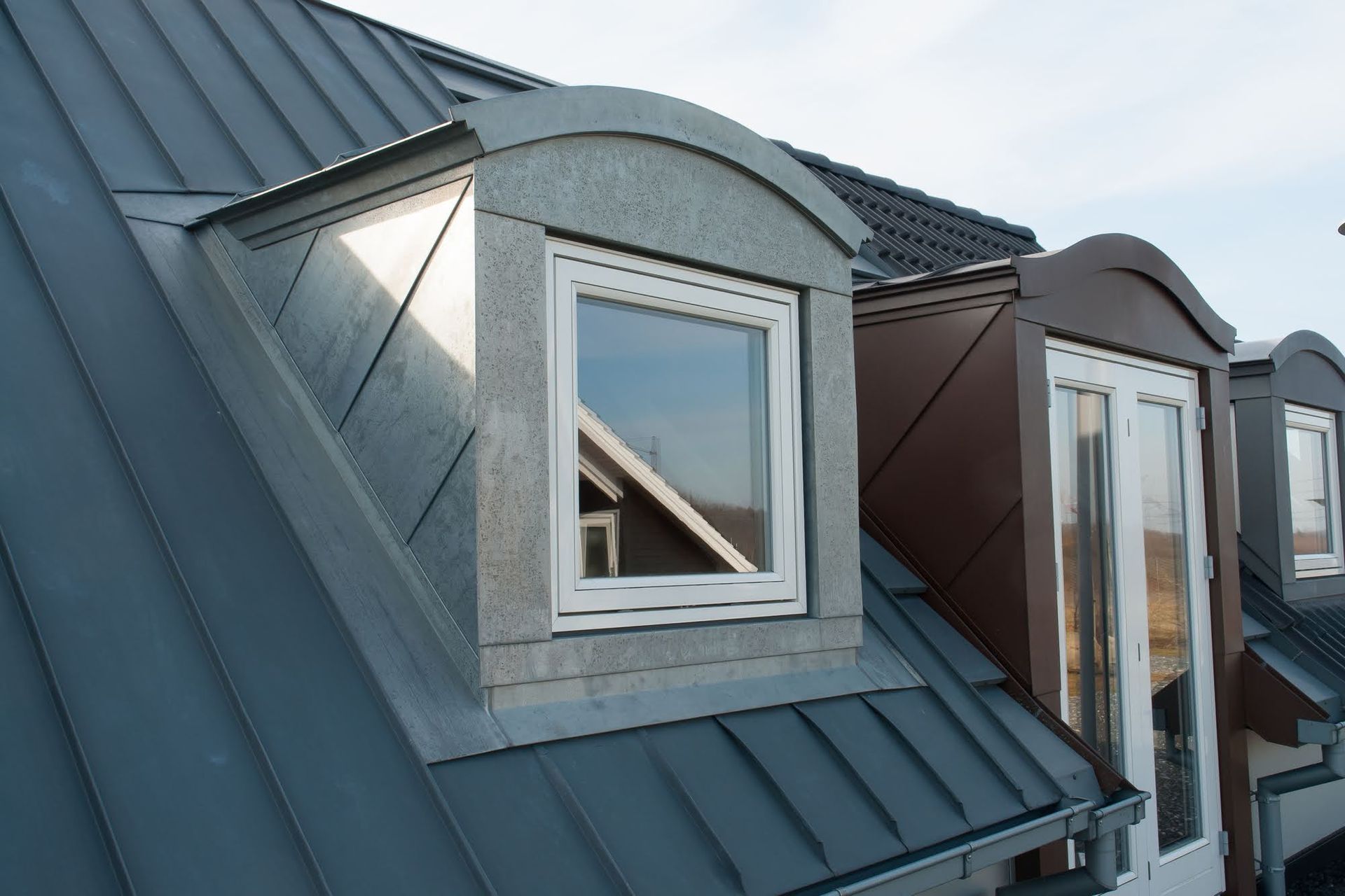 A roof with a window and a door on it