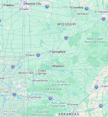 Map of Missouri with city labels and surrounding states in light green and blue roads/icons Map of Missouri with city labels and surrounding states in light green and blue roads/icons