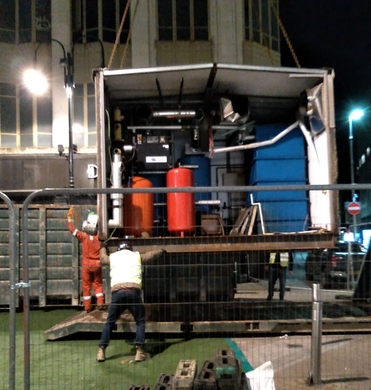 Plant being removed by crane from the roof of Debenhams
