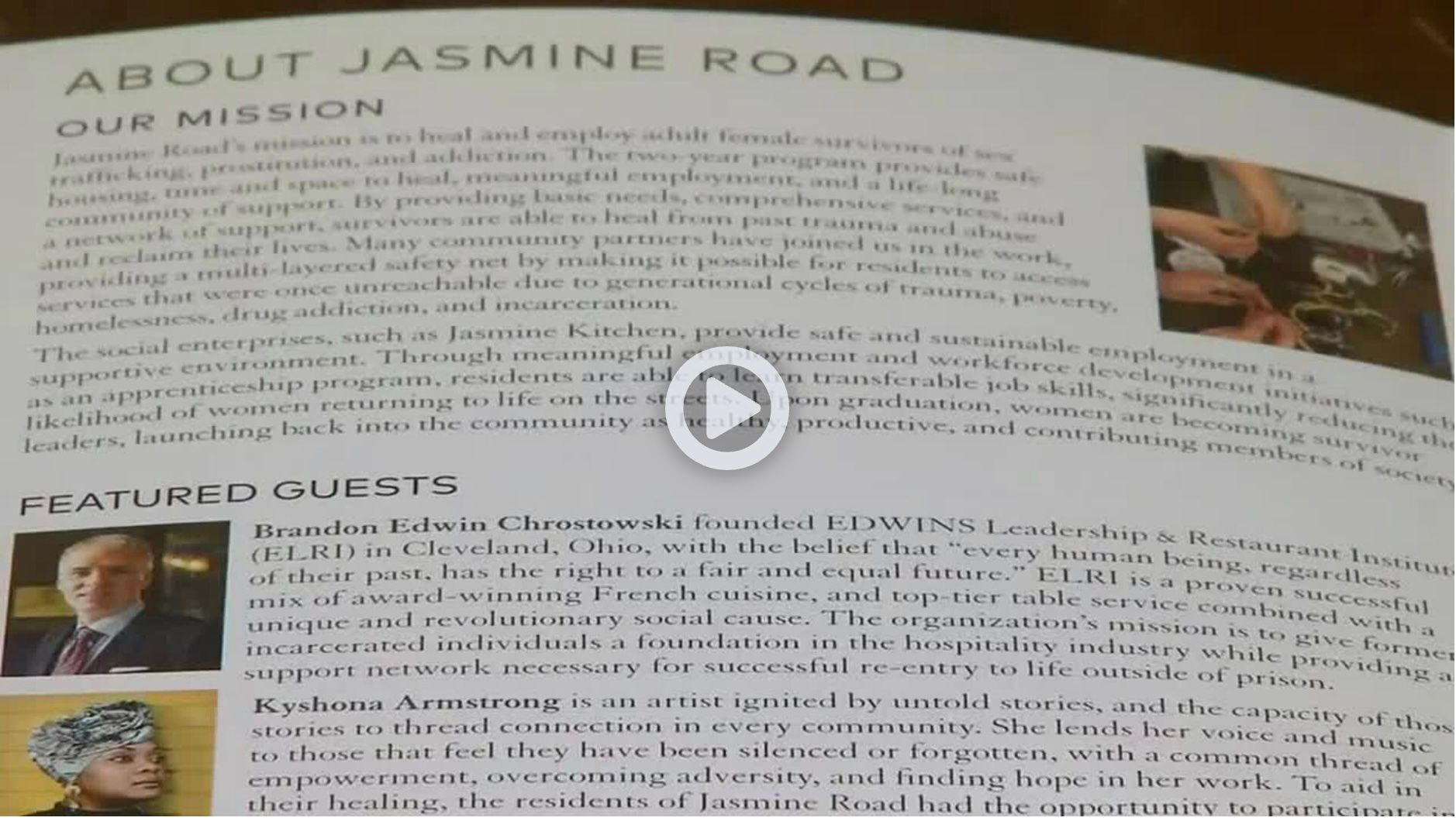 Brochure page titled “About Jasmine Road” with text, small portraits, and a play icon over the center