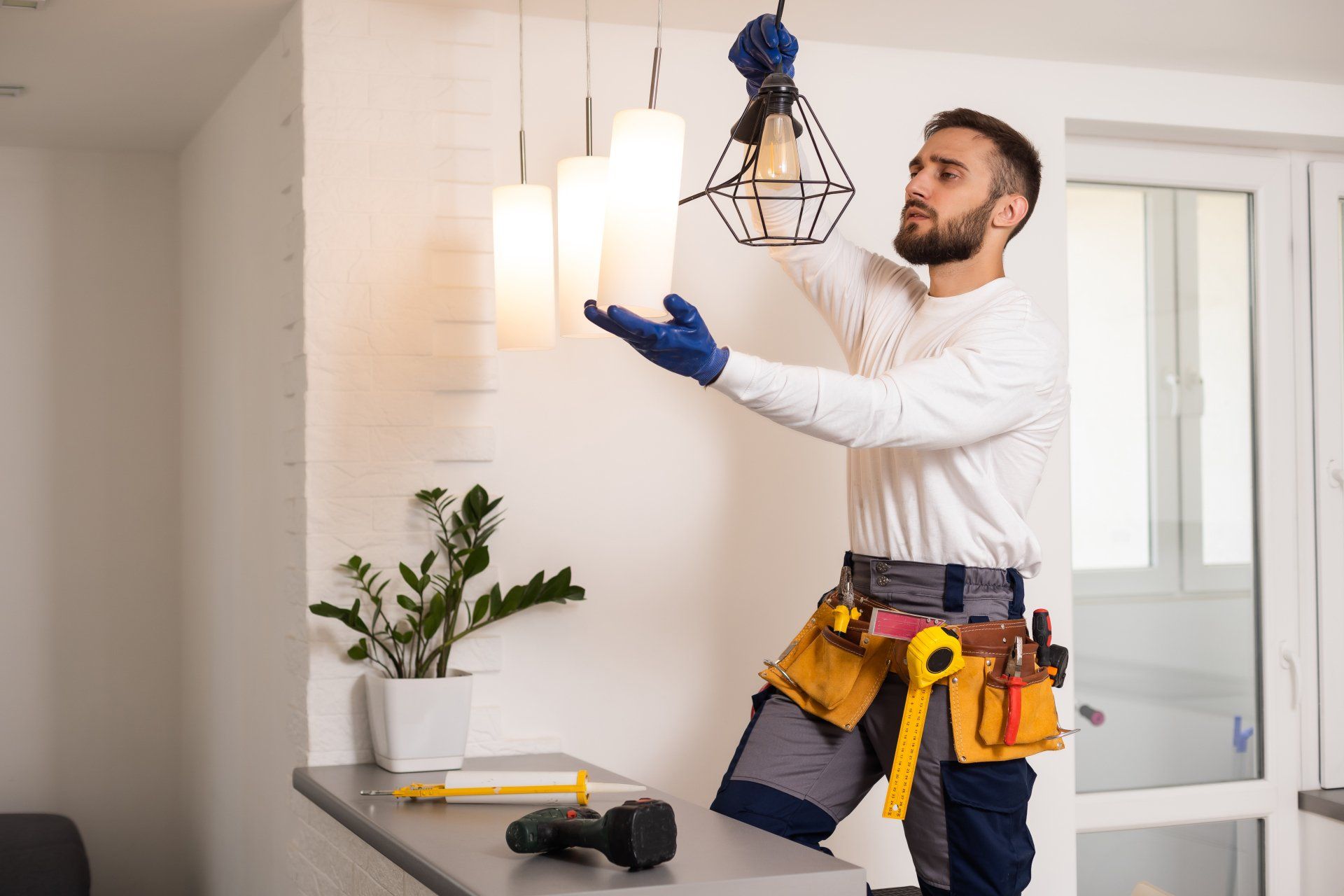 electrician installing lights