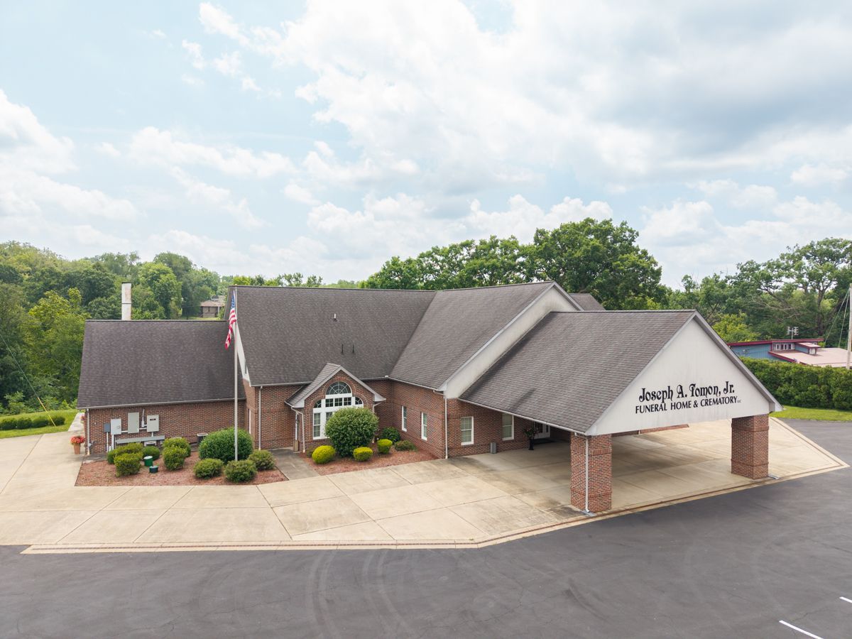 A large brick building with a sign that says joseph a. terreng jr. funeral home & crematory