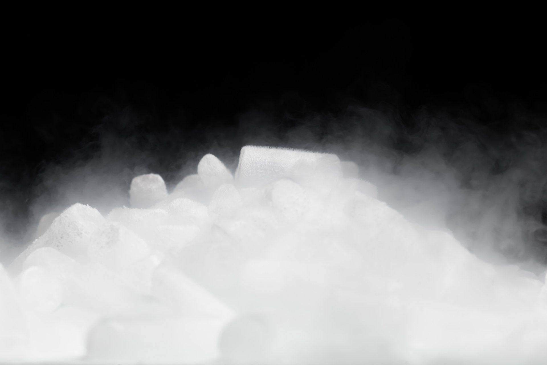 Dry Ice With Vapor On Black Background — Mundelein, IL — Lakeland Dry Ice