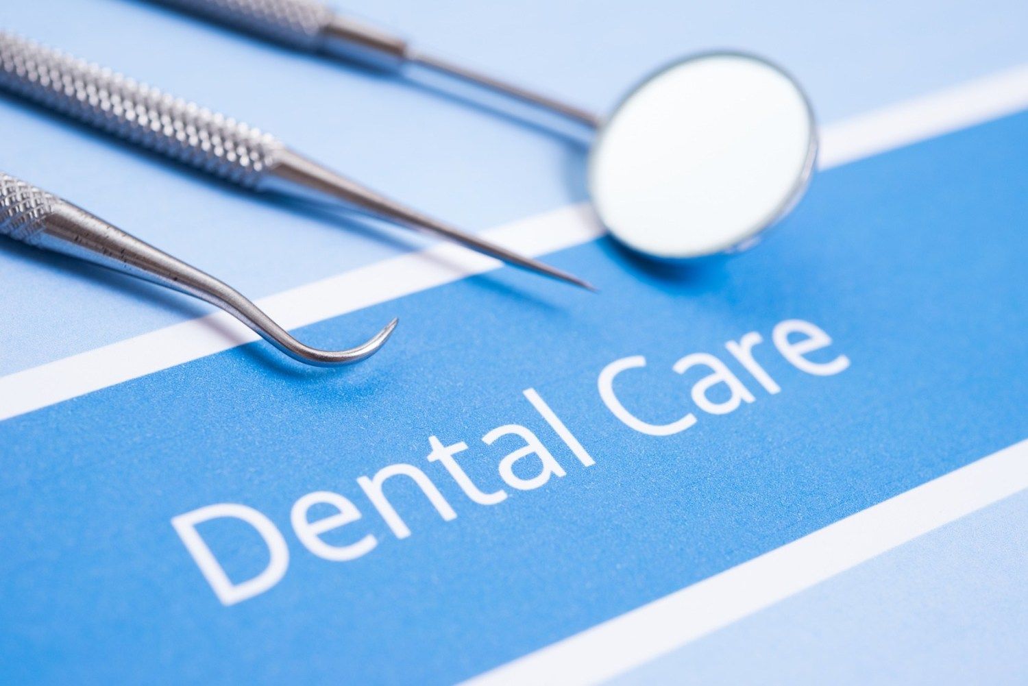 Dental care is written on a blue piece of paper