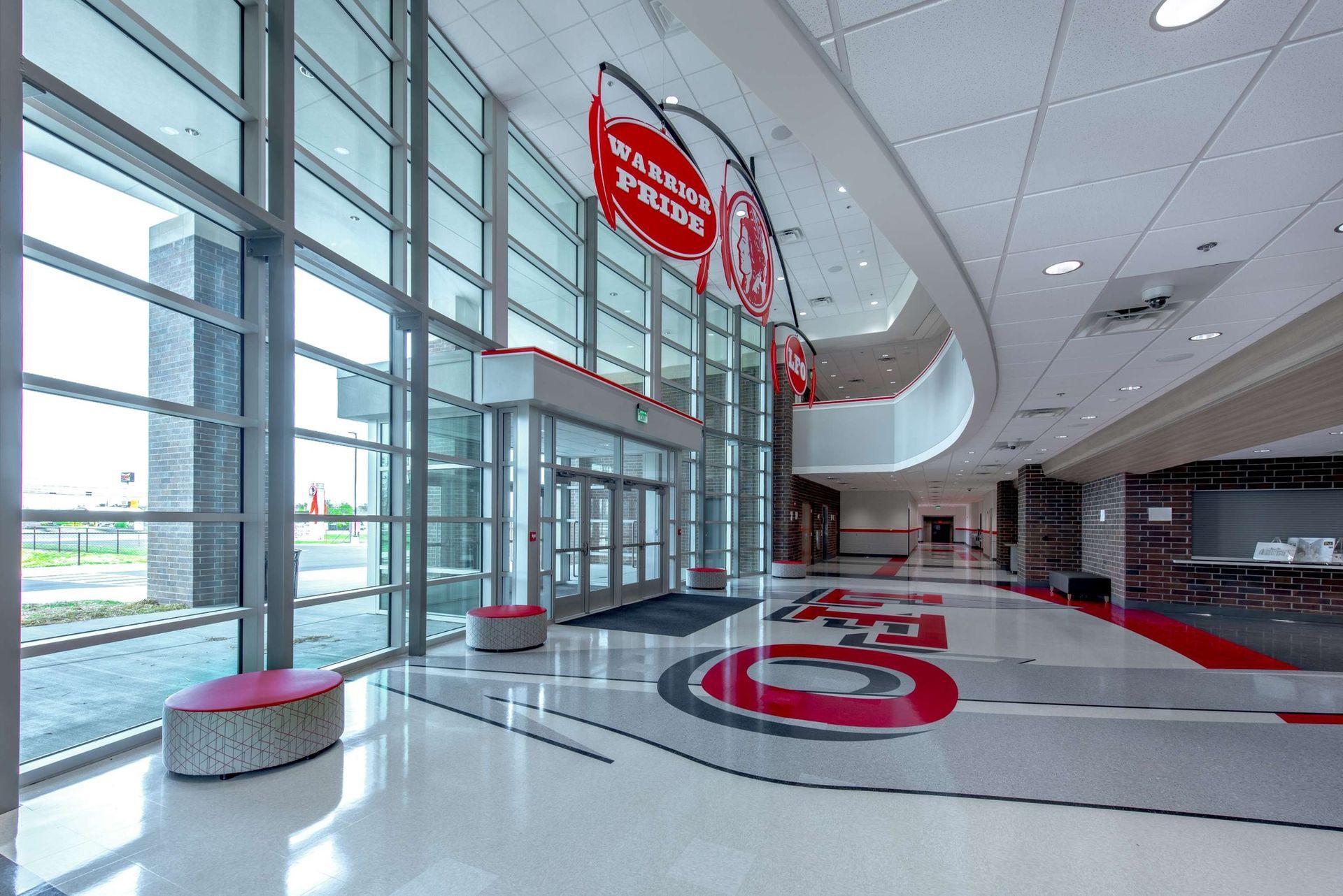 A large hallway with a sign that says boston bruins