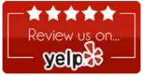 A red sign that says `` review us on yelp ''