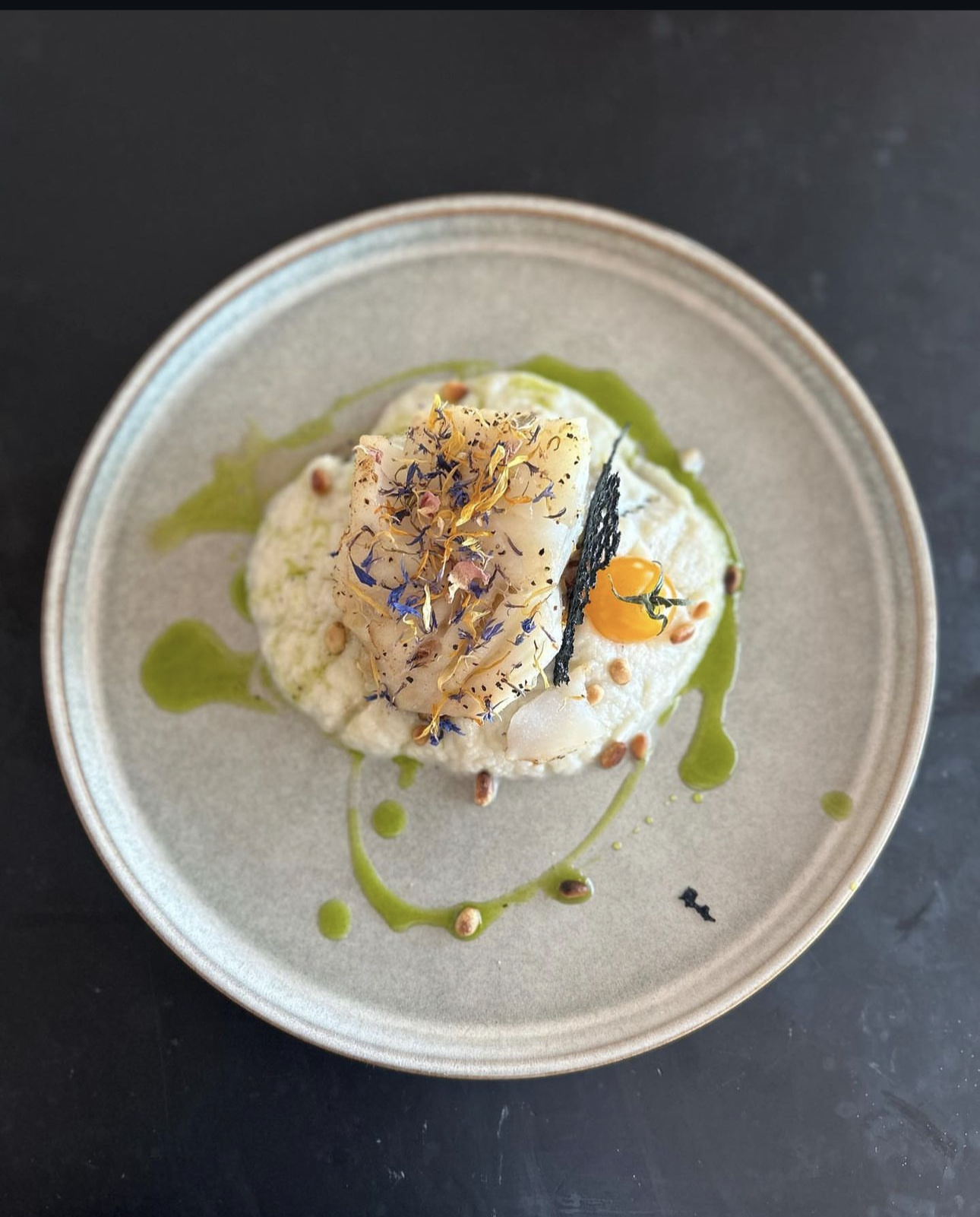 A close up of a plate of food on a table