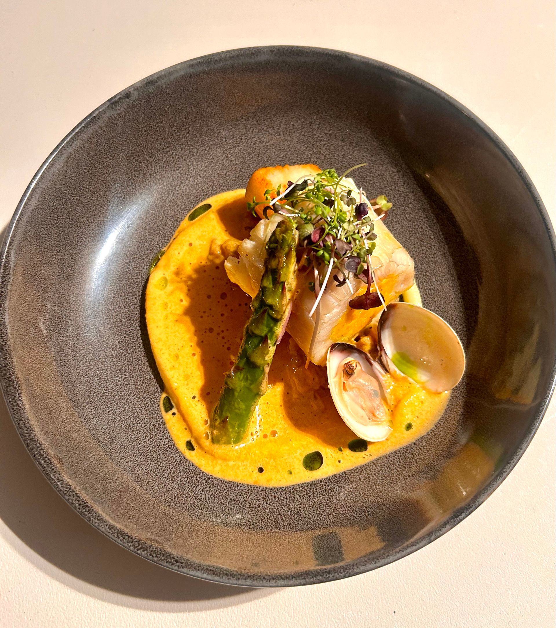 A close up of a plate of food on a table.