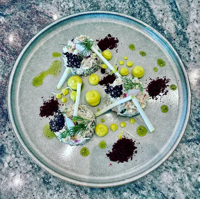 A close up of a plate of food on a table