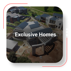 Aerial view of large, modern homes; text reads 