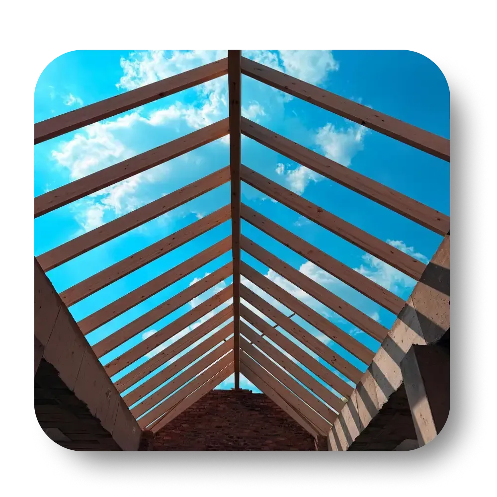 Blue sky visible through wooden beams forming a geometric tunnel