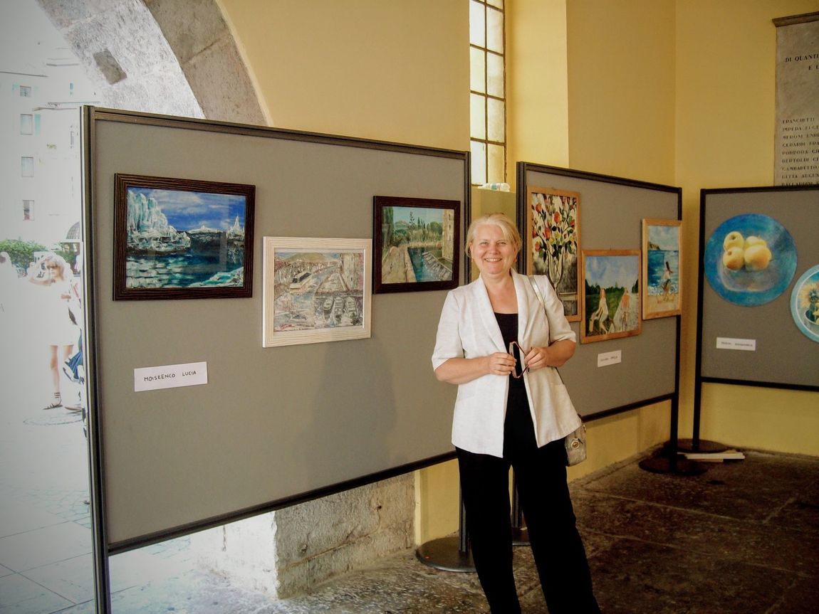Year 2010.  Exibition of Italian artists in Riva del Garda. Lucia Moiseenco -Tabacaru participated with three pictures.