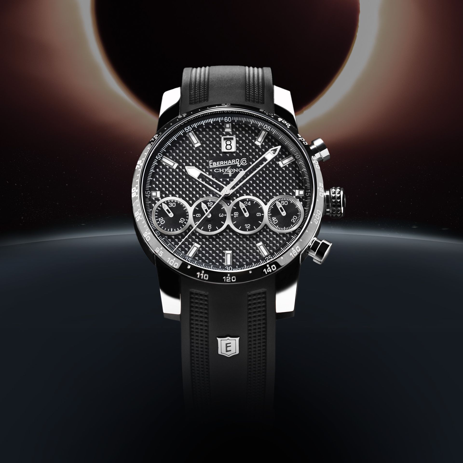 Un orologio nero con un cinturino nero 