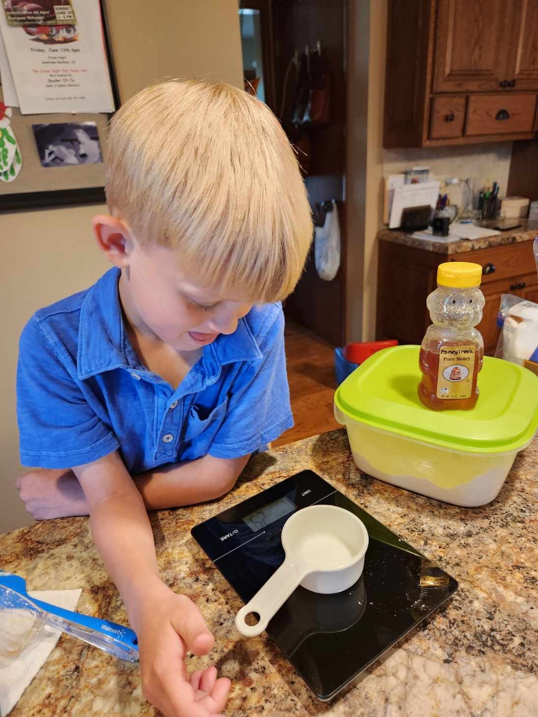 Child engaging with bread grant.