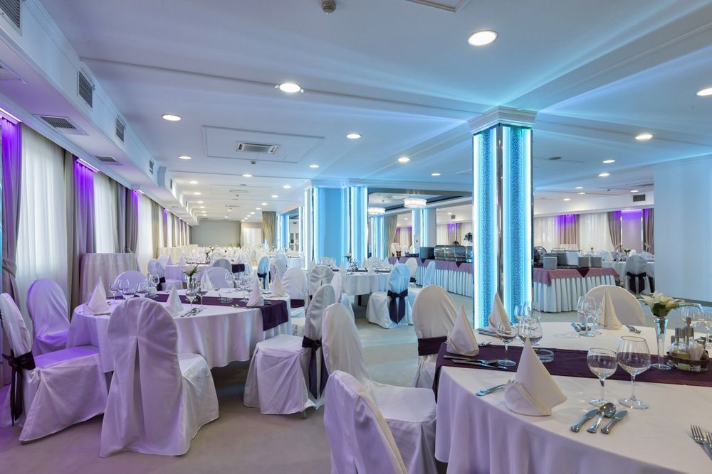 A Large Room With Tables and Chairs Set Up for a Wedding Reception — Tuncurry Washerteria In Forster, NSW