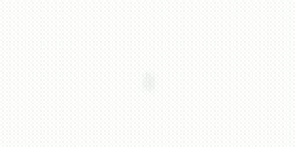 Mostly white blank screen with a faint gray spot near the center