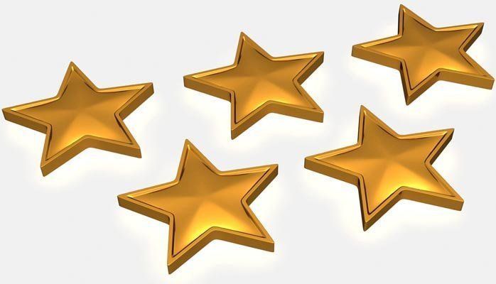Five gold stars on a white background, arranged in a scattered pattern