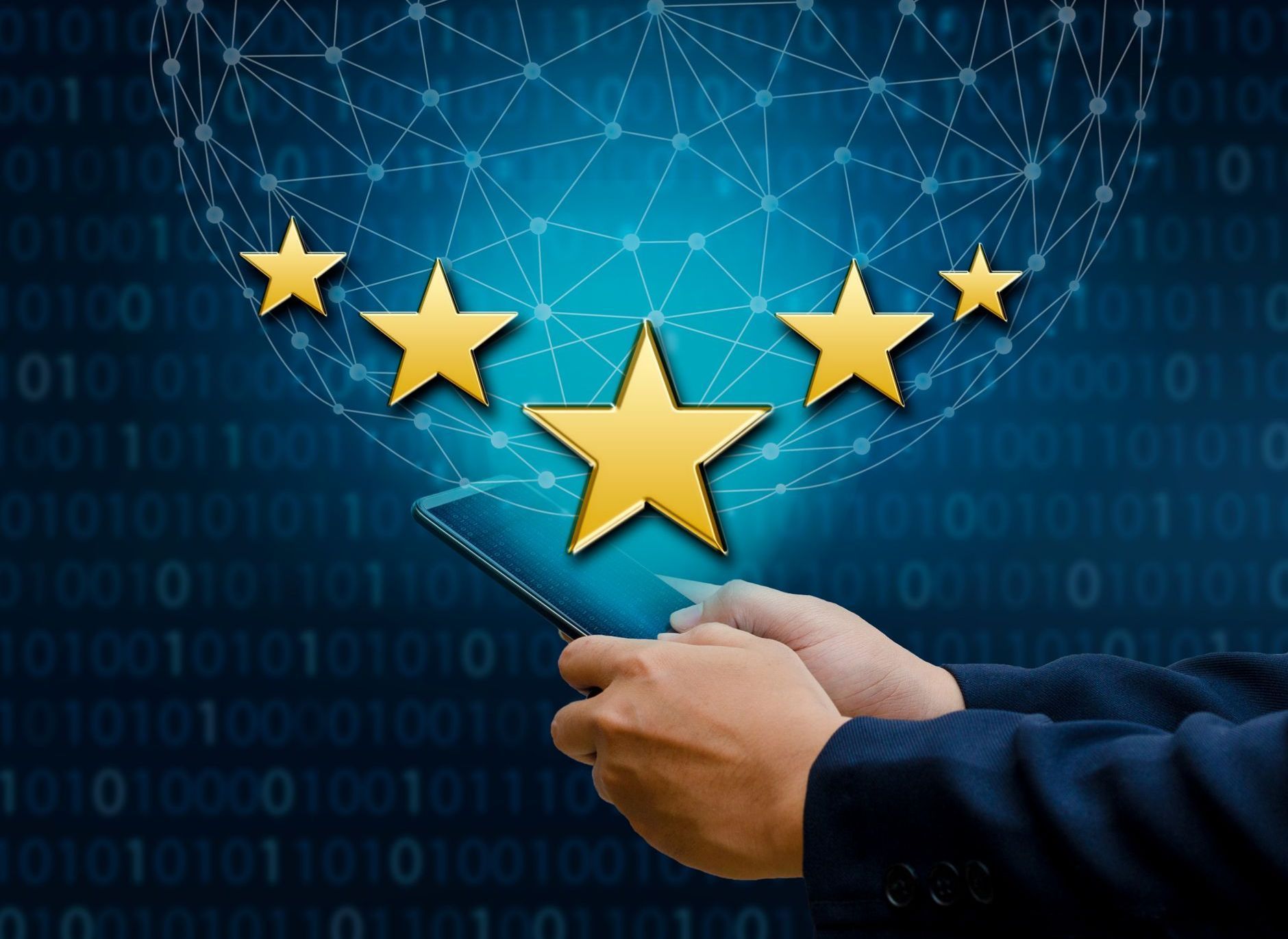 Hands holding a glowing blue digital network with gold stars on a tech-style background