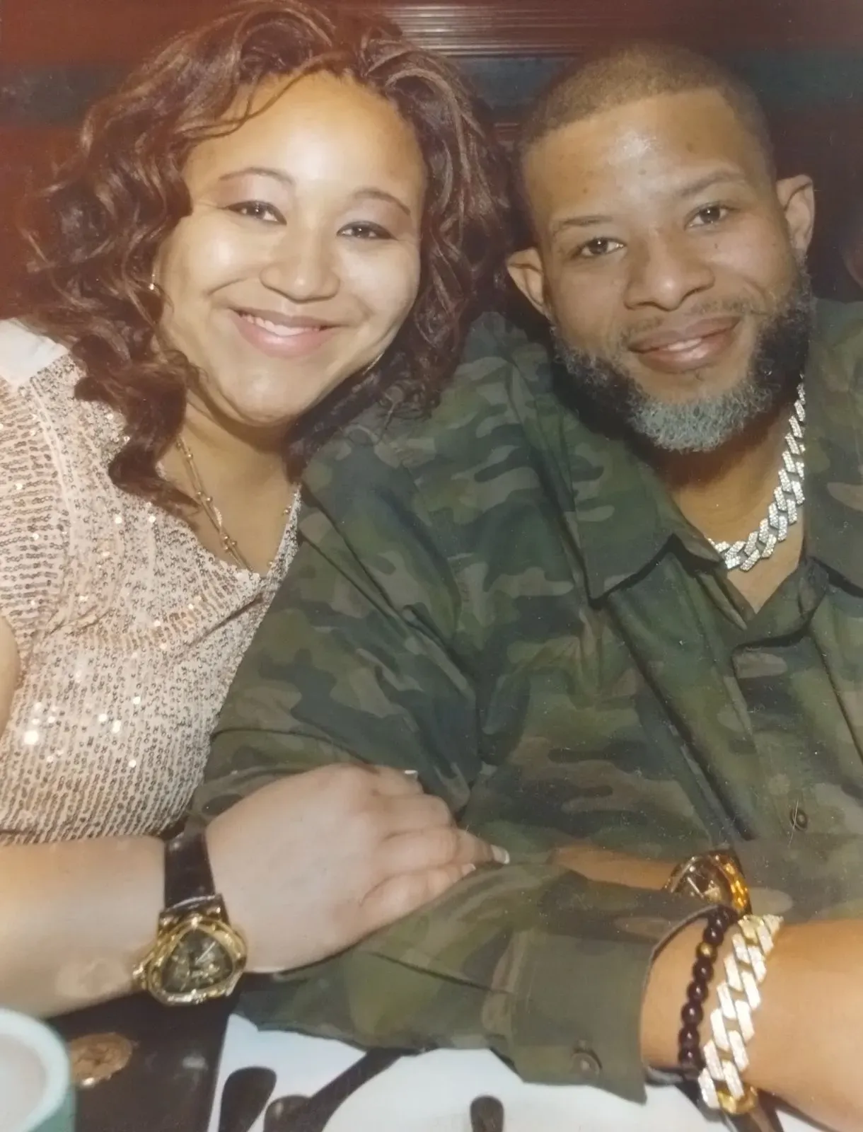 A man and a woman are posing for a picture