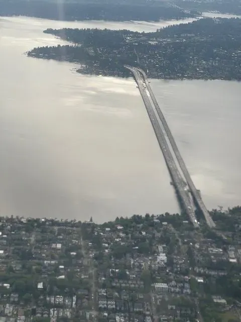 An aerial view of a bridge over a body of water