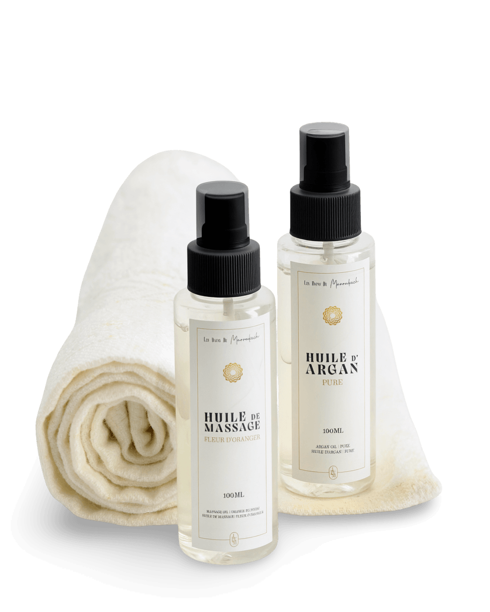 Huiles de massage et d’argan Les Bains de Marrakech avec serviette blanche