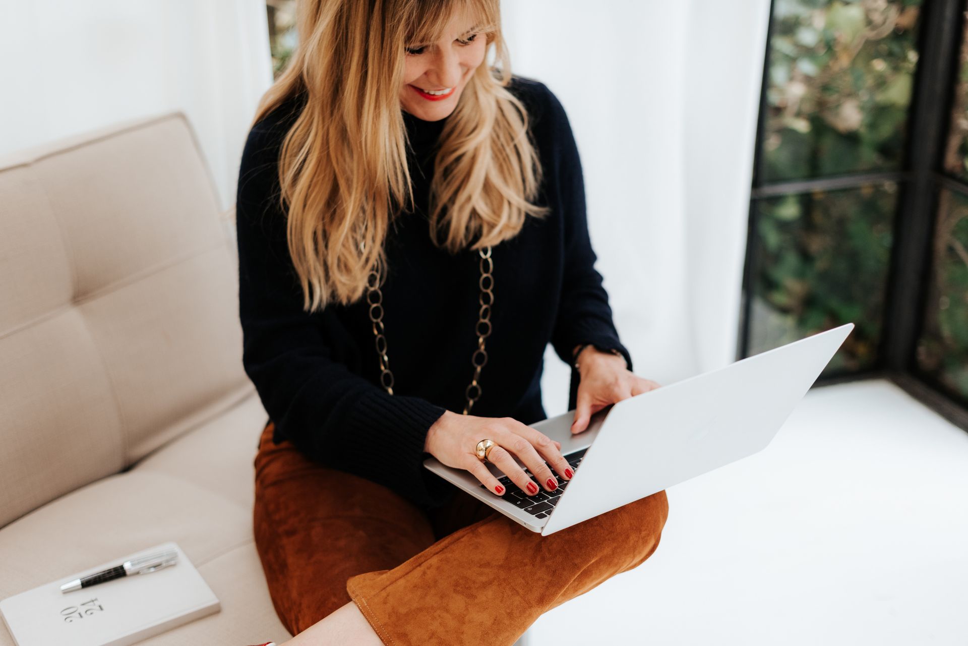 Carolyn Schlak at the laptop