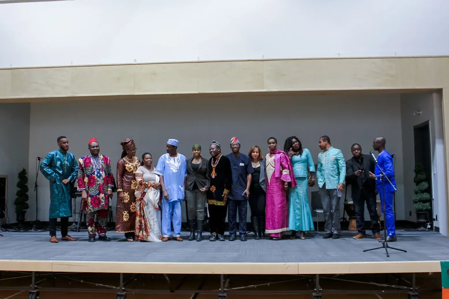 A group of people are standing on a stage.