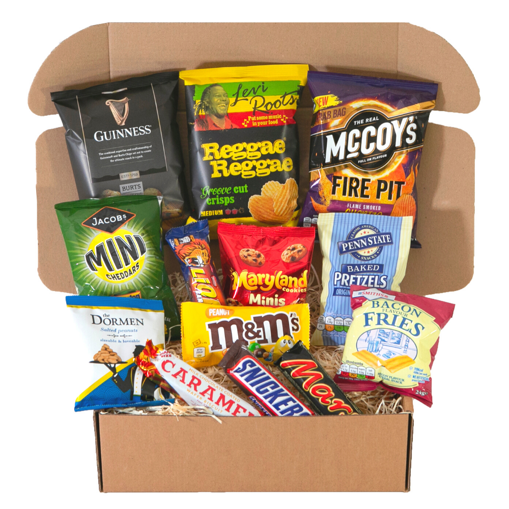 A box filled with a variety of snacks including m & m 's and snickers