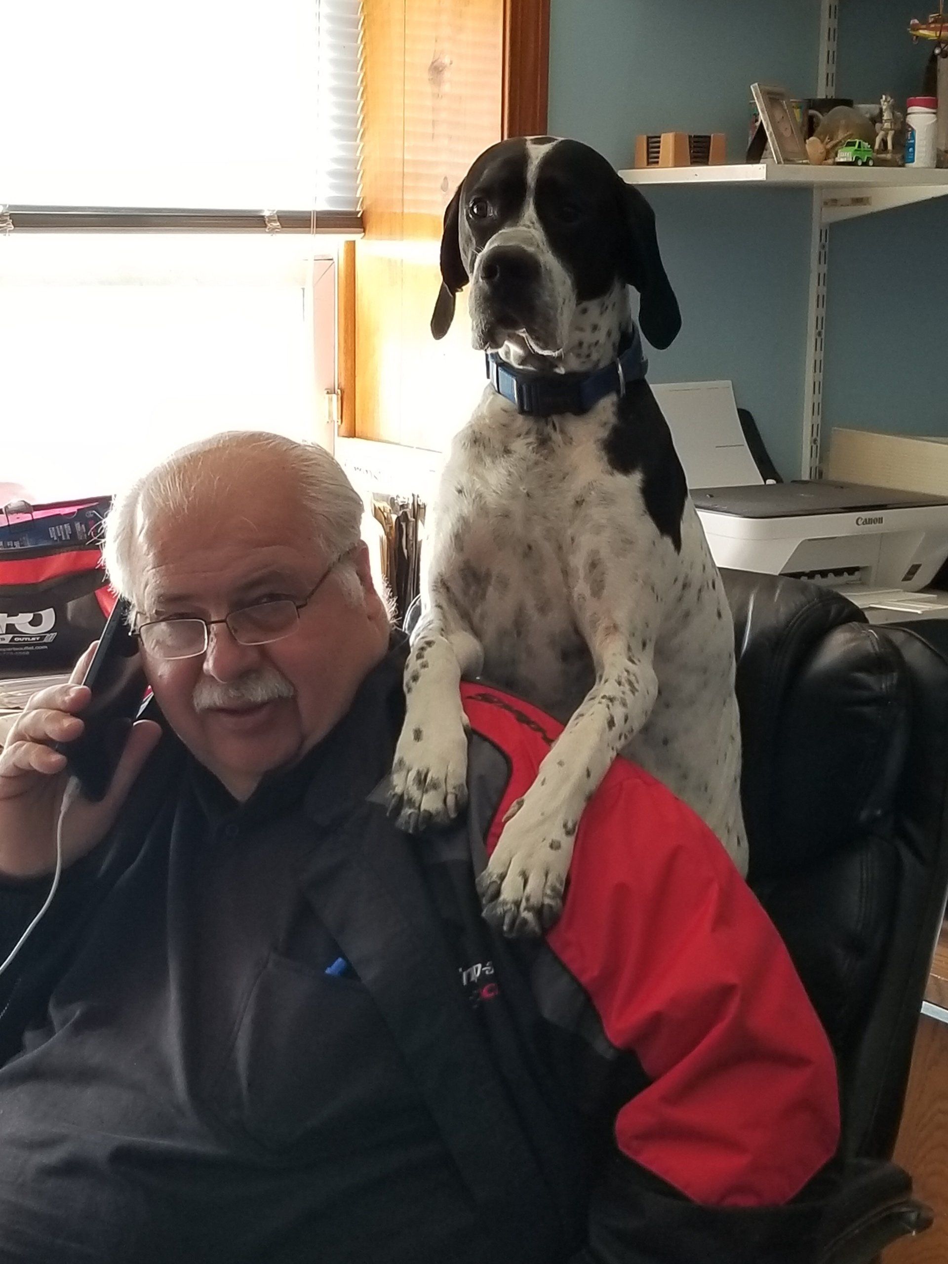 Owner Frank Markos and shop dog Emma 